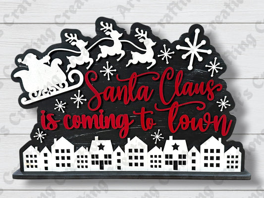 Santa Claus is coming to town shelf sitter